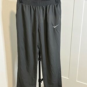 Classic Nike pull-on track pants with a relaxed Y2K athleisure vibe